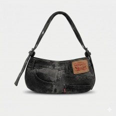 לצפייה במוצר תיק עבודת יד עשוי ממכנסי ליוויס וינטאג׳ בצבע שחור